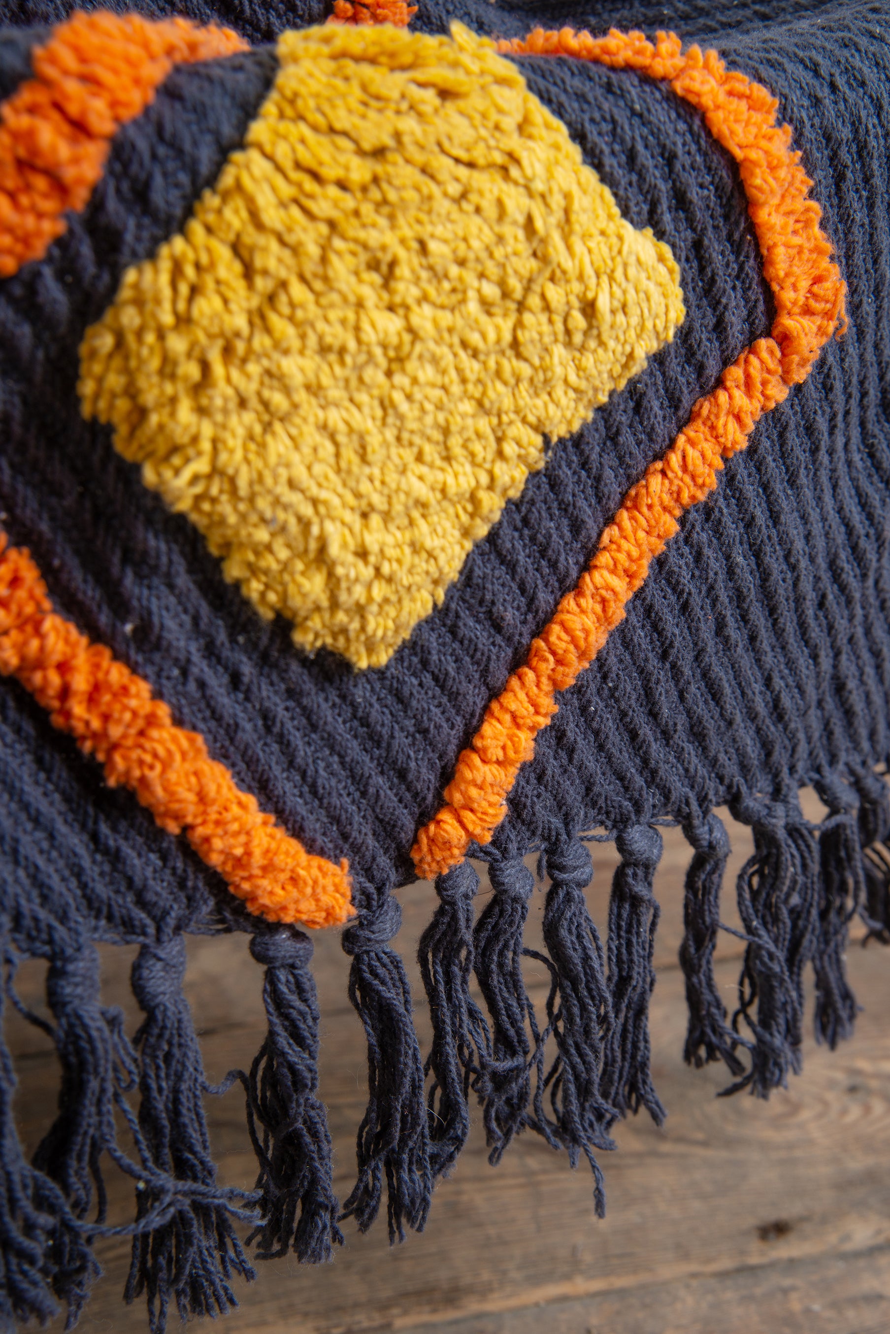 Orange and navy online throw